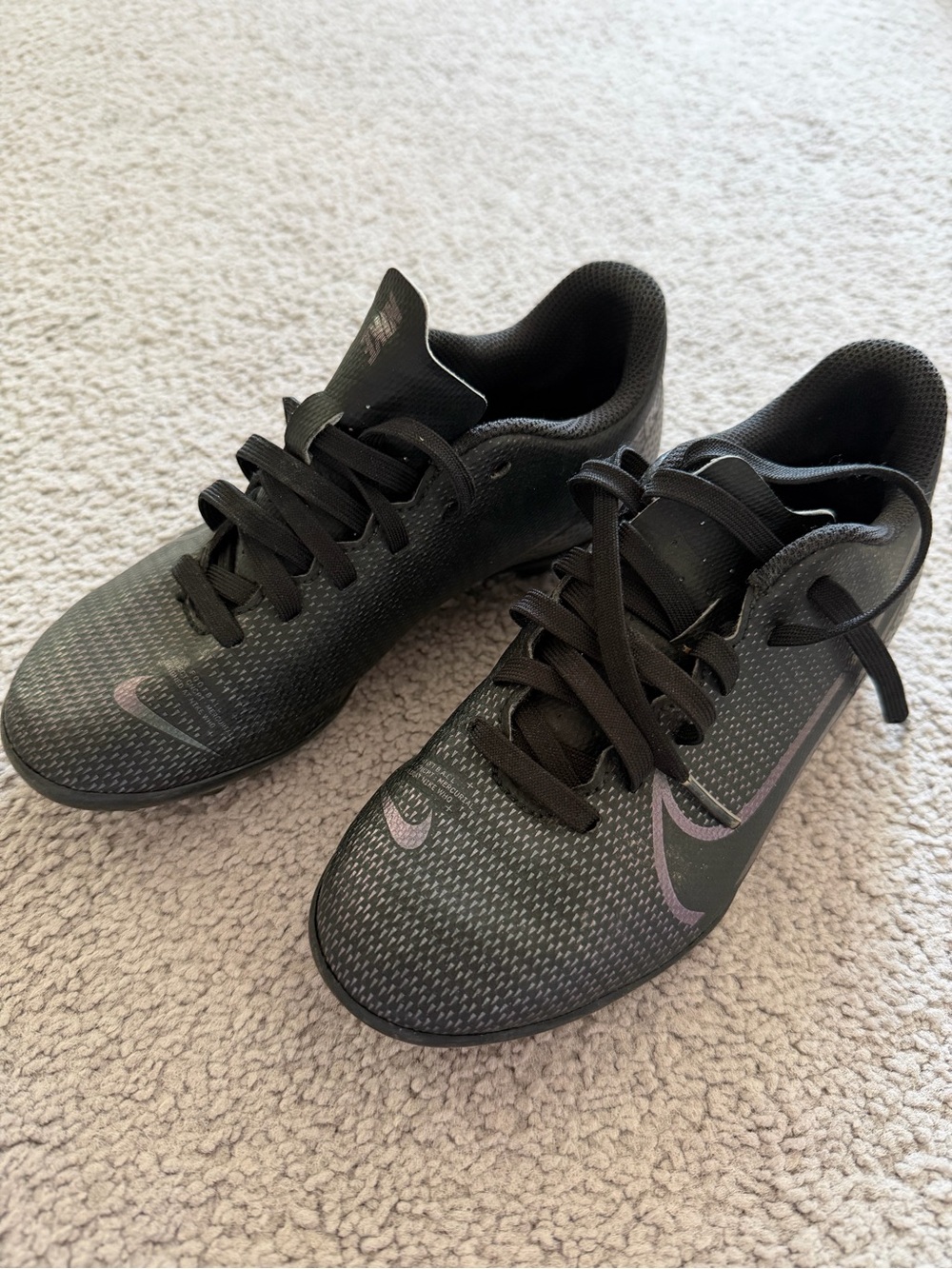 Nike Black Cleats with Subtle Purple Swoosh